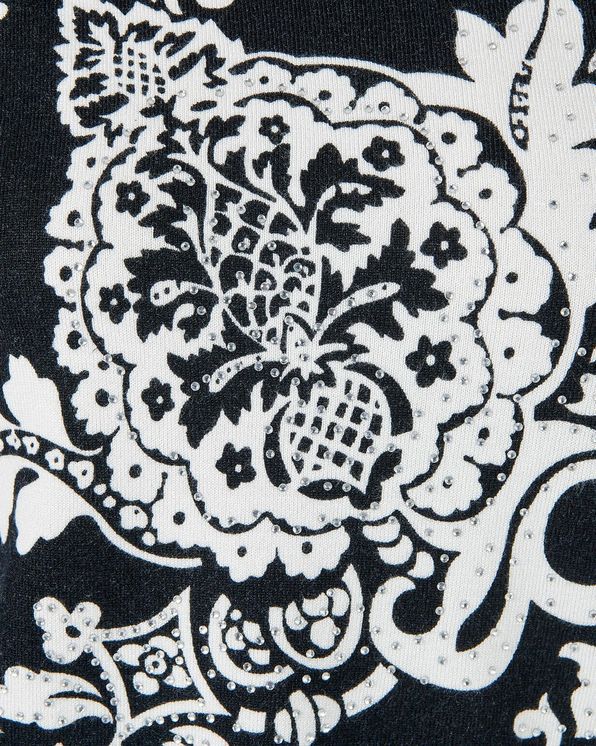 Pull bicolore motif floral et strass