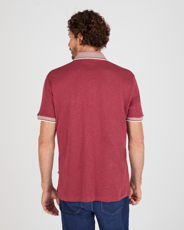 Polo manches courtes en maille reliéfée